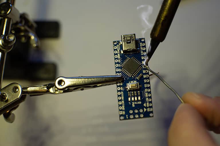 Soldering an Arduino Nano Board.