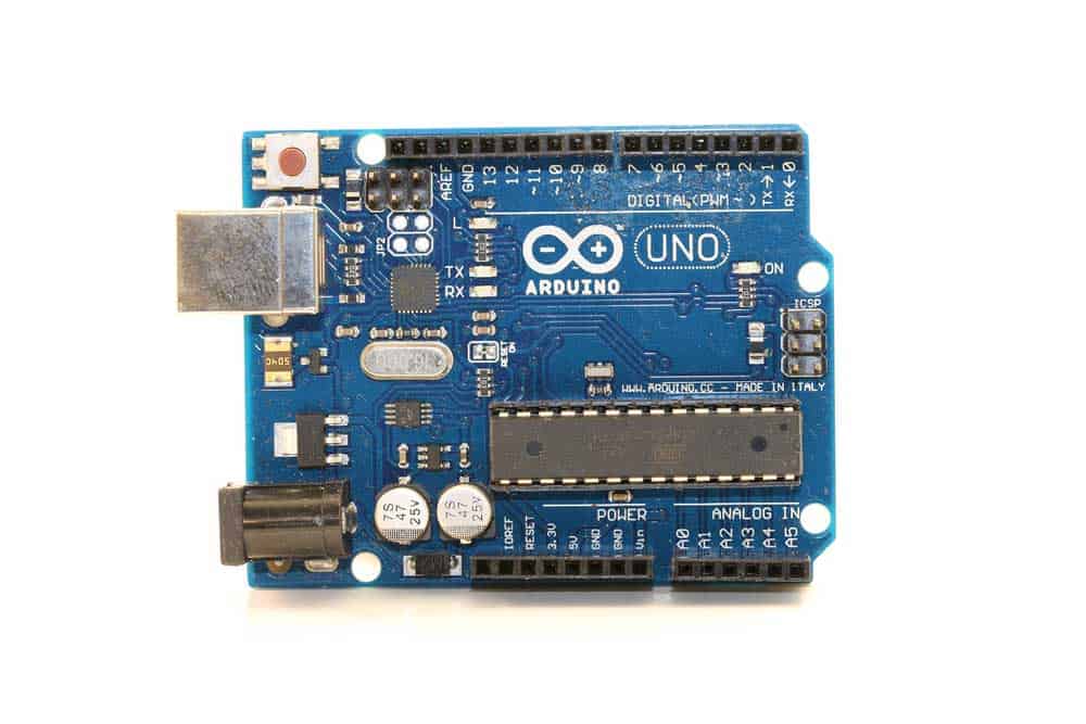 An Arduino UNO board (note the ceramic resonator directly above the ATmega328P chip)