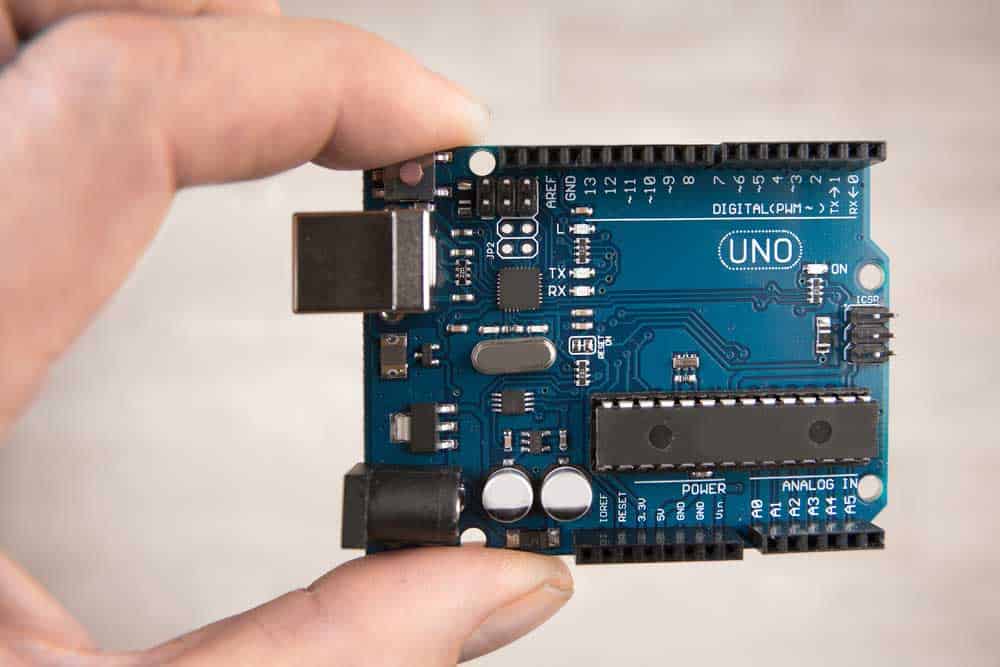 An Arduino UNO board (note the USB port, digital PWM pins, and analog pins