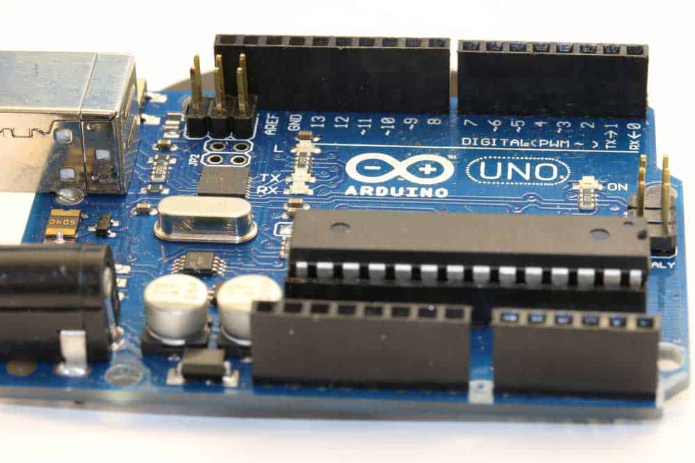 An Arduino UNO board (note the ATmega328P and crystal oscillator)